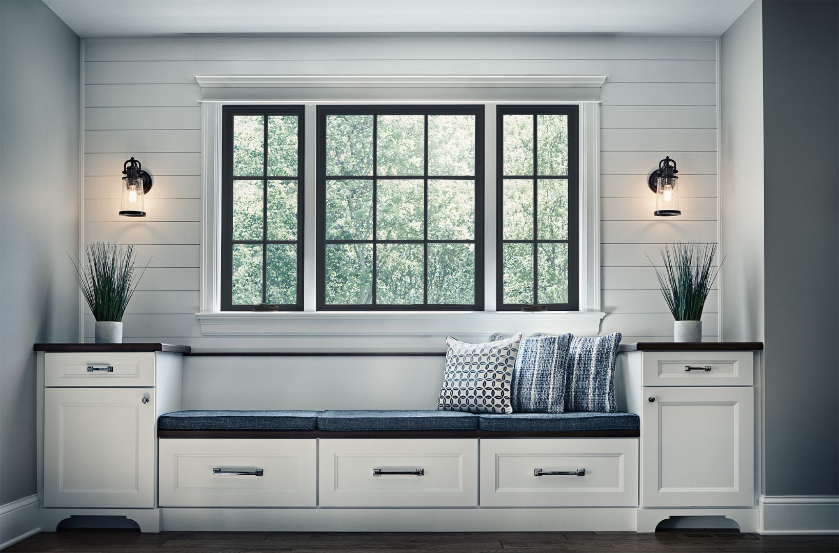 JELD-WEN Siteline® black clad wood windows in a Coastal Farmhouse built-in nook with traditional grilles and shiplap wall paneling