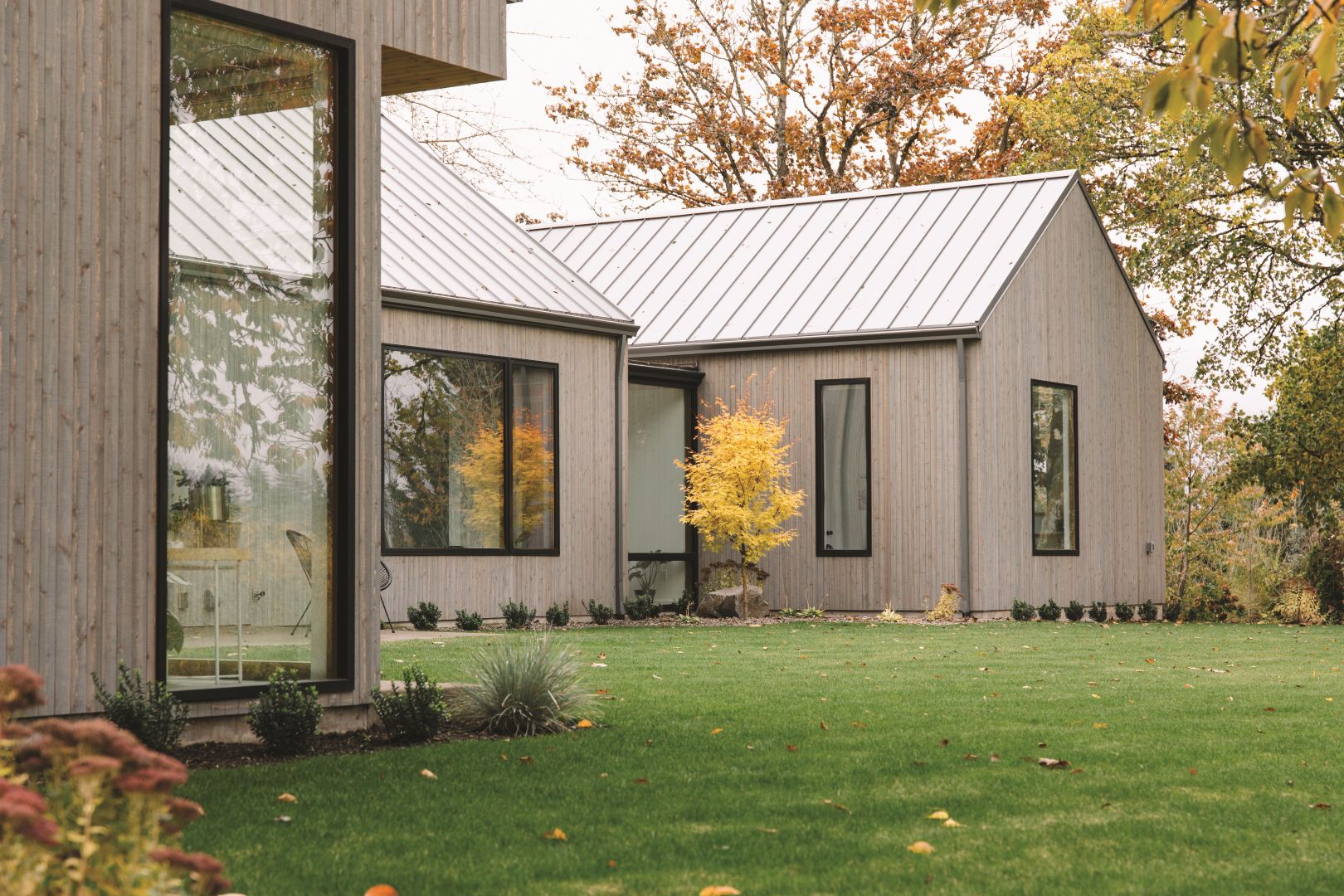 Direct set picture and casement JELD-WEN Siteline® clad windows with narrow black frames